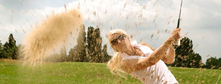 Woman playing golf